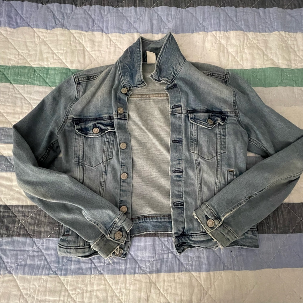 Size 8 slightly distressed light wash, jean jacket